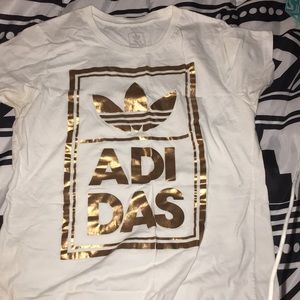 Adidas superstars sneakers with a matching shirt